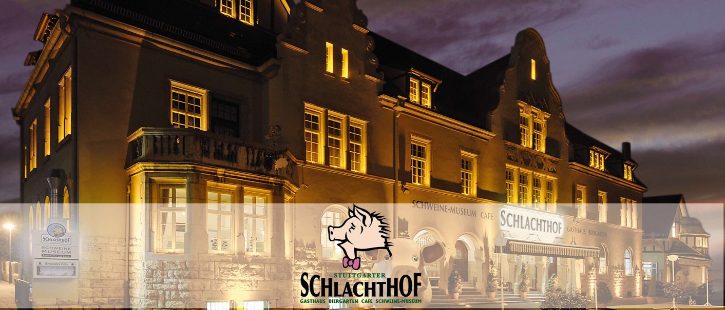 The Stuttgarter Schlachthof restaurant is illuminated at night. The façade features a pig museum and a café., © Wilhelmer Gastronomiebetriebe GmbH The Stuttgarter Schlachthof restaurant is illuminated at night. The façade features a pig museum and a café., © Wilhelmer Gastronomiebetriebe GmbH