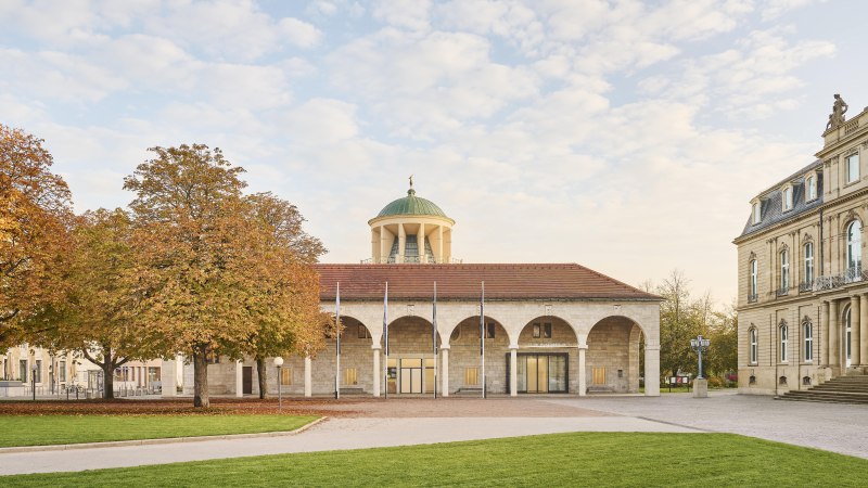 Historic building with dome and arches, surrounded by autumnal trees and manicured lawns., &copy; Simon Sommer