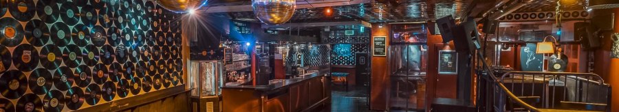 Club with vinyl records on the walls and ceiling, disco balls and bar. Atmospheric lighting and empty dance floor., &copy; Goldmarks, Stuttgart