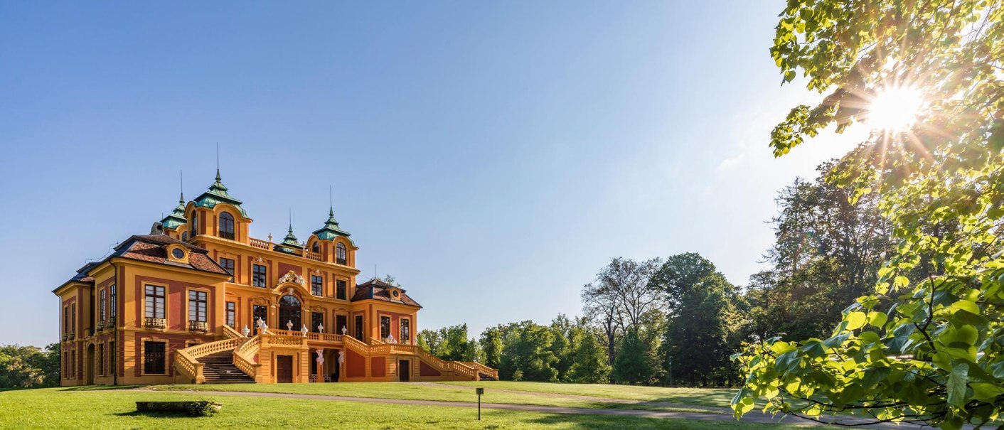 Favorite Palace in Ludwigsburg, surrounded by green trees and bright sunshine. The Baroque architecture stands out against the blue sky., &copy; &copy; Stuttgart-Marketing GmbH, Werner Dieterich