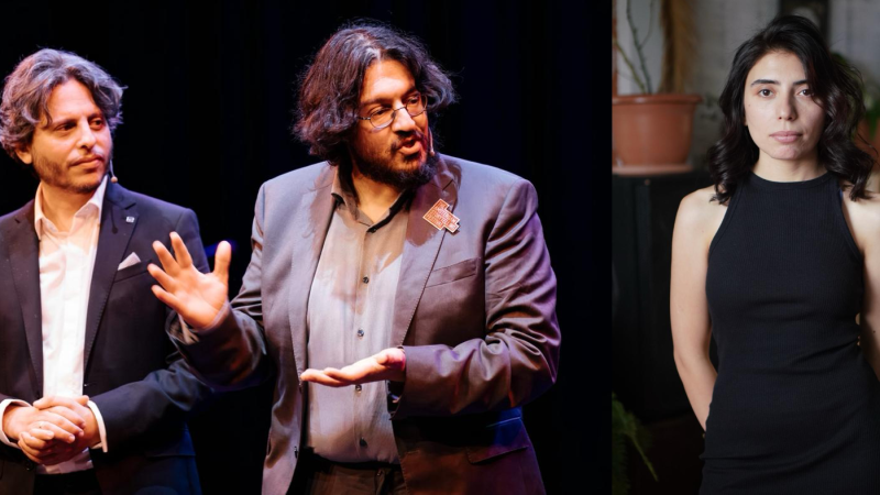 Zwei Männer in Anzügen diskutieren auf einer Bühne, während eine Frau in einem schwarzen Kleid in einem Innenraum steht., © Raphael Rodan, Sahand Sahebdivani, Mary Aygetsy Zwei Männer in Anzügen diskutieren auf einer Bühne, während eine Frau in einem schwarzen Kleid in einem Innenraum steht., © Raphael Rodan, Sahand Sahebdivani, Mary Aygetsy