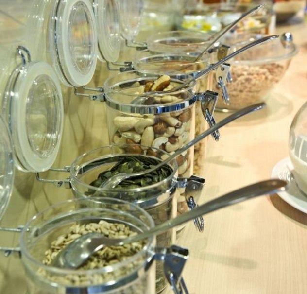 Jars of nuts and seeds on a breakfast buffet, ready to serve. Spoons are stuck in the glasses., © Hotel Neuwirtshaus Jars of nuts and seeds on a breakfast buffet, ready to serve. Spoons are stuck in the glasses., © Hotel Neuwirtshaus