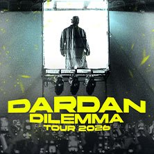 Poster for the Dardan Dilemma Tour 2026 with a silhouetted person on stage and yellow text., &copy; links im Bild