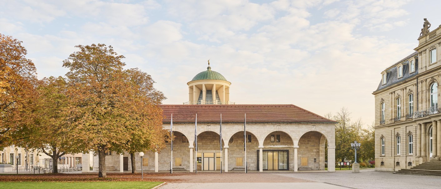 Historic building with dome and arches, surrounded by autumnal trees and manicured lawns., &copy; Simon Sommer