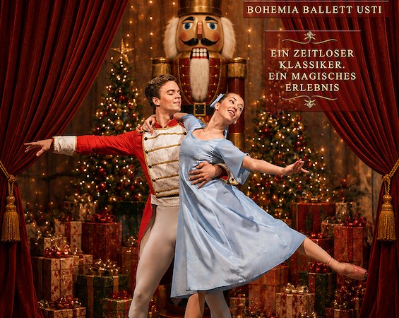 Stage performance of The Nutcracker with dancers in colorful costumes against a festively decorated backdrop. A man holds a nutcracker figure., &copy; Point Event GmbH