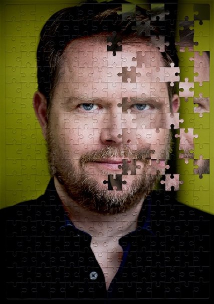 Portrait of a man as a puzzle, some pieces missing. Background in green, face partly incomplete., &copy; Renitenztheater Stuttgart e.V.