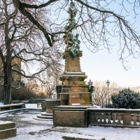 Snow-covered Eugensplatz in Stuttgart with the Galatea Fountain in the foreground. The trees are bare and the city is visible in the background., &copy; Stuttgart-Marketing GmbH, Sarah Schmid