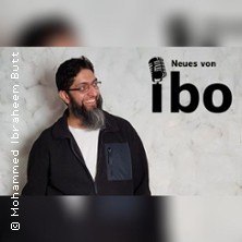 A man with a beard and glasses smiles in front of a light-colored wall. To the right of him is a microphone symbol with the words 'News from Ibo'., &copy; see on the left