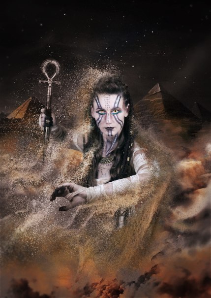 A mystical figure with an ankh and sand swirl in front of pyramids, Egyptian style., &copy; Gruseldinner GmbH & Co. KG