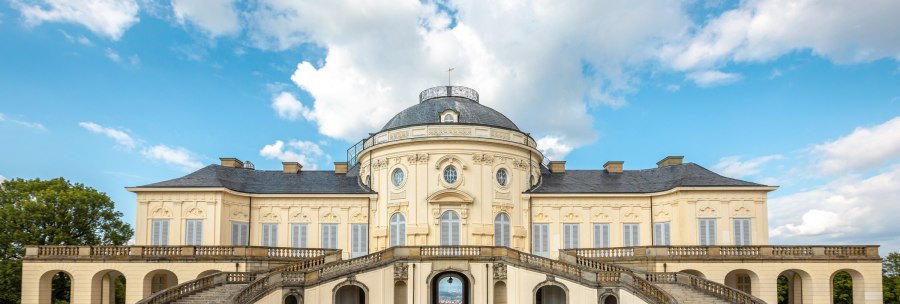 Solitude Palace with symmetrical fa&ccedil;ade, staircase and blue sky in the background., &copy; Kartin Lehr VIEL UNTERWEGS