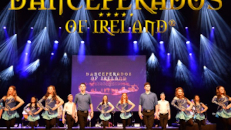 Dance group Danceperados of Ireland on a stage surrounded by blue light effects and snowflake decorations., &copy; Music Circus Concertb&uuml;ro GmbH &CoKG