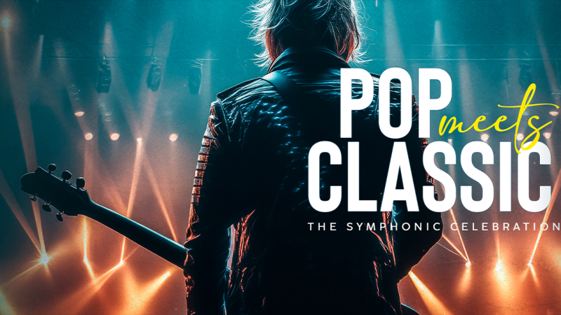 Ein Musiker steht mit einer Gitarre auf einer Bühne, umgeben von bunten Lichtern. Der Text 'POP MEETS CLASSIC - The Symphonic Celebration' ist eingeblendet., © links im Bild Ein Musiker steht mit einer Gitarre auf einer Bühne, umgeben von bunten Lichtern. Der Text 'POP MEETS CLASSIC - The Symphonic Celebration' ist eingeblendet., © links im Bild