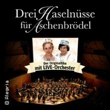 Poster for 'Three Hazelnuts for Cinderella' with live orchestra. Film title above, picture of two characters below, orchestra on stage below., &copy; links im Bild
