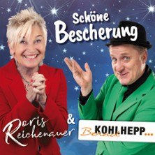 Doris Reichenauer und Herr Hämmerle in festlicher Kleidung vor einem sternenübersäten Hintergrund. Sie lächeln und verbreiten eine fröhliche Stimmung., © links im Bild Doris Reichenauer und Herr Hämmerle in festlicher Kleidung vor einem sternenübersäten Hintergrund. Sie lächeln und verbreiten eine fröhliche Stimmung., © links im Bild