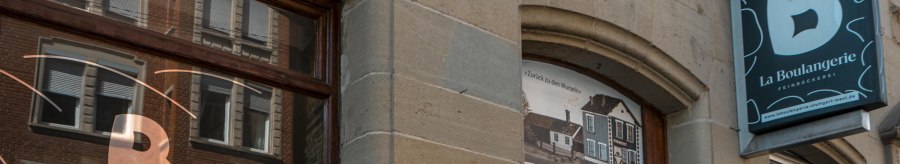 Exterior view of the bakery 'La Boulangerie' with shop window and sign. The building has a stone fa&ccedil;ade and reflects the surrounding architecture., &copy; SMG Stuttgart Marketing GmbH - Sarah Schmid
