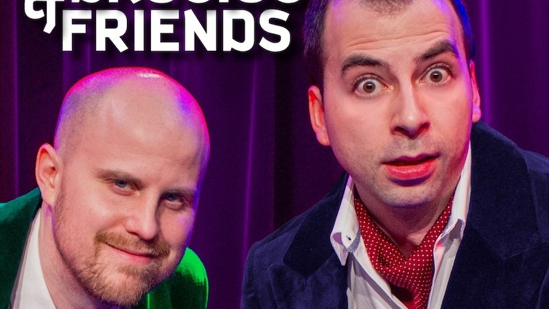 Zwei Männer in Anzügen stehen vor einem lila Vorhang. Links trägt einer einen grünen Anzug, rechts einen blauen. Oben steht 'Theisen & Brosius & Friends'., © Renitenztheater Stuttgart e.V. Zwei Männer in Anzügen stehen vor einem lila Vorhang. Links trägt einer einen grünen Anzug, rechts einen blauen. Oben steht 'Theisen & Brosius & Friends'., © Renitenztheater Stuttgart e.V.