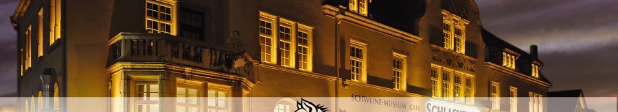 The Stuttgarter Schlachthof restaurant is illuminated at night. The façade features a pig museum and a café., © Wilhelmer Gastronomiebetriebe GmbH The Stuttgarter Schlachthof restaurant is illuminated at night. The façade features a pig museum and a café., © Wilhelmer Gastronomiebetriebe GmbH