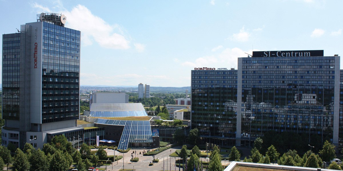 Modern buildings of the SI-Centrum in Stuttgart under a clear sky, featuring the Dormero Hotel and the surrounding architecture., © Dormero Hotel Stuttgart Modern buildings of the SI-Centrum in Stuttgart under a clear sky, featuring the Dormero Hotel and the surrounding architecture., © Dormero Hotel Stuttgart