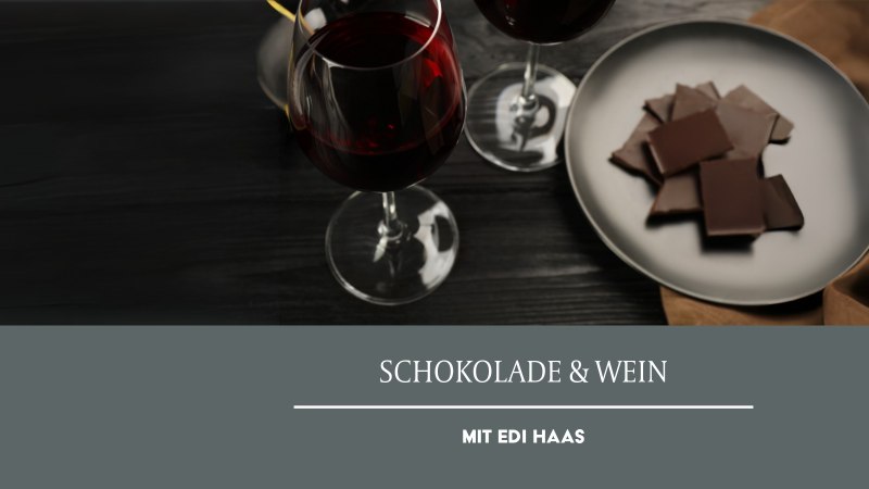 Two glasses of red wine and a plate of chocolate on a dark table. The text "Chocolate & Wine with Edi Haas" is visible below., © Weinmanufaktur Stuttgart eG Two glasses of red wine and a plate of chocolate on a dark table. The text "Chocolate & Wine with Edi Haas" is visible below., © Weinmanufaktur Stuttgart eG