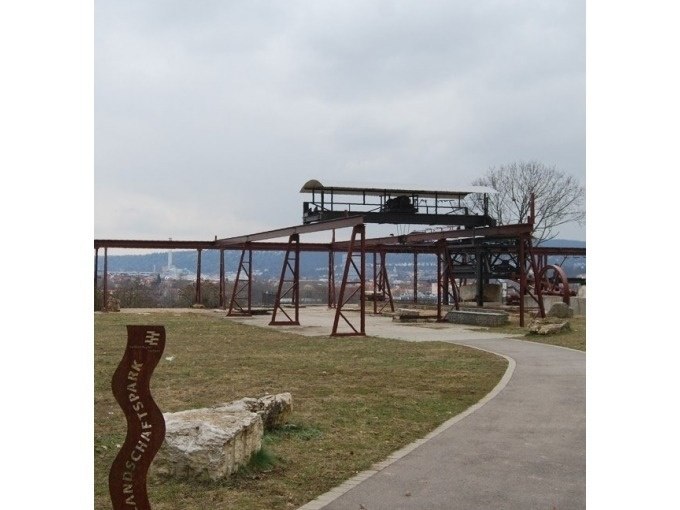 Old industrial plant in the travertine park, surrounded by meadows and a path. An urban landscape can be seen in the background., &copy; Cool-Tours StattReisen