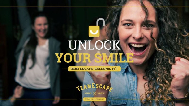 Woman cheering with clenched fists, other people celebrating in the background. Text: "Unlock Your Smile" and "TeamEscape"., &copy; TeamEscape Stuttgart