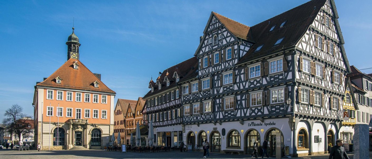 The town square in Schorndorf features the historic town hall and a half-timbered house on a sunny day., &copy; SMG Stuttgart Marketing GmbH - Sarah Schmid