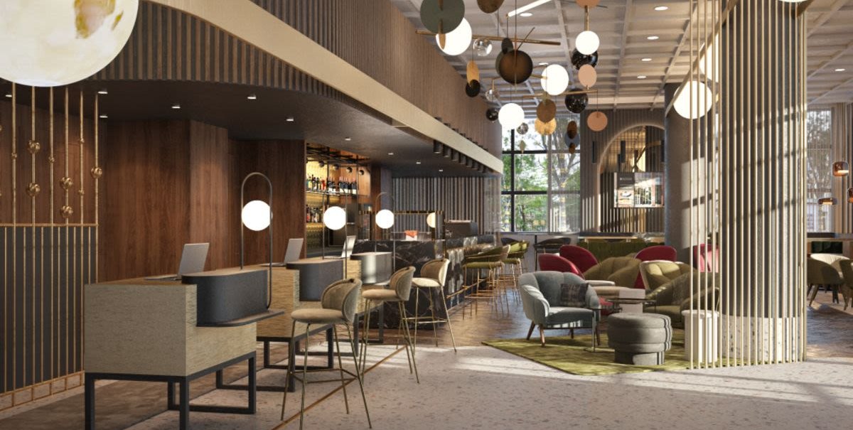 Moderne Hotel-Lobby mit eleganter Einrichtung, stilvollen Möbeln und dekorativer Beleuchtung. Große Fenster lassen viel Licht herein., © Pullman Stuttgart Fontana