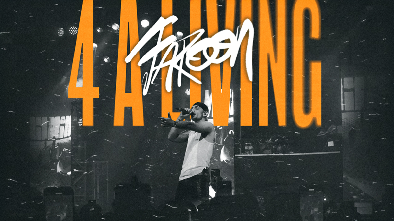 A musician on stage with a microphone, surrounded by lighting effects. '4 A Living' is written large in the background., &copy; links im Bild