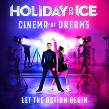 Zwei Personen posieren vor einem bunten Hintergrund mit Scheinwerfern. Der Titel 'Holiday on Ice - Cinema of Dreams' ist oben zu sehen., © links im Bild Zwei Personen posieren vor einem bunten Hintergrund mit Scheinwerfern. Der Titel 'Holiday on Ice - Cinema of Dreams' ist oben zu sehen., © links im Bild