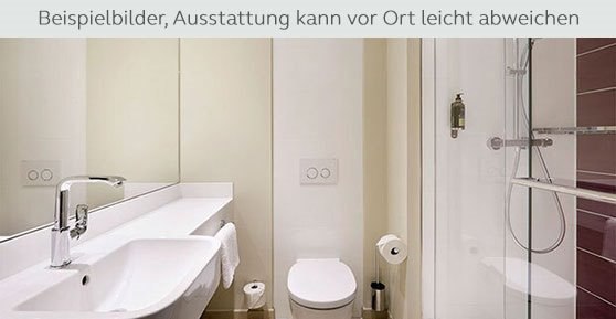 Modernes Badezimmer mit Waschbecken, Toilette und Dusche. Hinweis: Ausstattung kann vor Ort abweichen., © Premier Inn