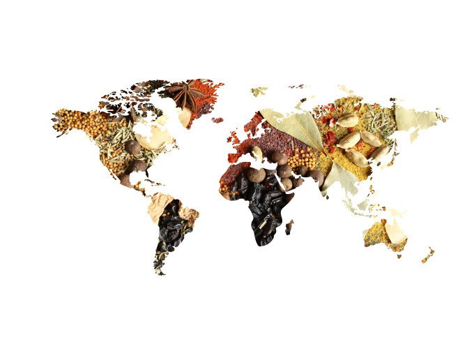World map created from various spices that form the continents. Colorful mixture of herbs and spices on a white background., &copy; Cool-Tours StattReisen