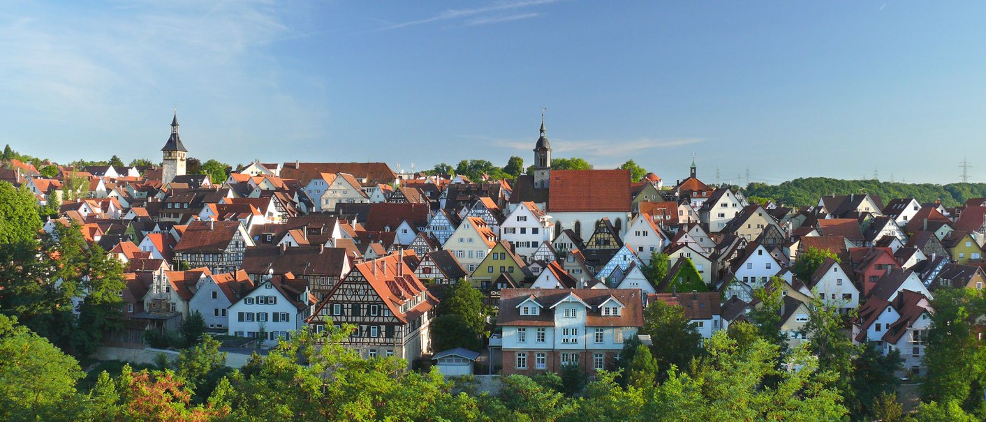 Panorama of the old town of Marbach am Neckar with many half-timbered houses and church towers under a blue sky., © Dieter Sukowski Panorama of the old town of Marbach am Neckar with many half-timbered houses and church towers under a blue sky., © Dieter Sukowski