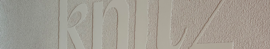 The logo of the knitz restaurant can be seen in large white letters on a textured wall., © Stuttgart-Marketing GmbH