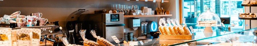 Interior view of Patisserie Isabella with gluten-free baked goods and products. Bright, inviting atmosphere with decorative shelves and counter., &copy; SMG, Sarah Schmid