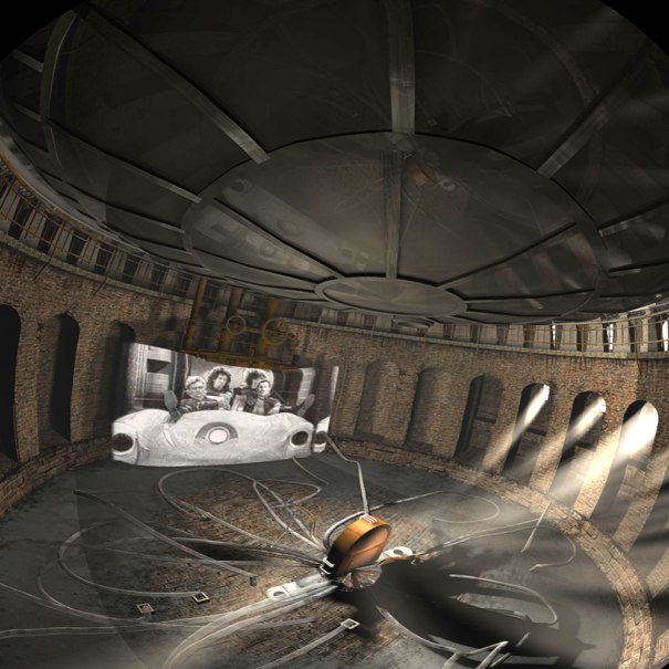 Round building with domed ceiling, projector in the middle, movie screen showing a black and white image. Beams of light fall through windows., &copy; Planetarium Stuttgart