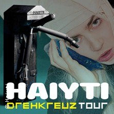 Poster der Haiyti Drehkreuz Tour 2026 mit einem Drehkreuz und einer Person im Hintergrund. Der Schriftzug 'Haiyti Drehkreuz Tour' ist prominent platziert., &copy; links im Bild