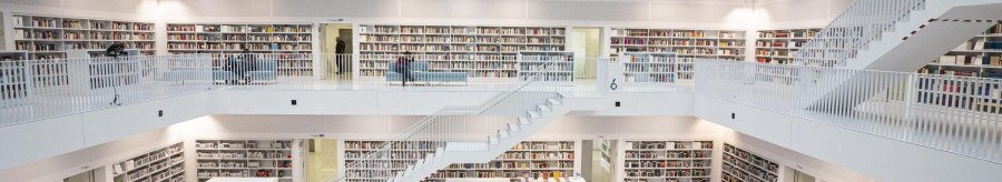 Interior view of Stuttgart City Library with several floors, white walls and shelves full of books. People move around the floors., &copy; Stuttgart-Marketing GmbH, Sarah Schmid