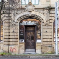 A historic building with the lettering 'Brother Louis' above the front door. The fa&ccedil;ade is made of stone with decorative elements., &copy; Stuttgart-Marketing GmbH, Sarah Schmid