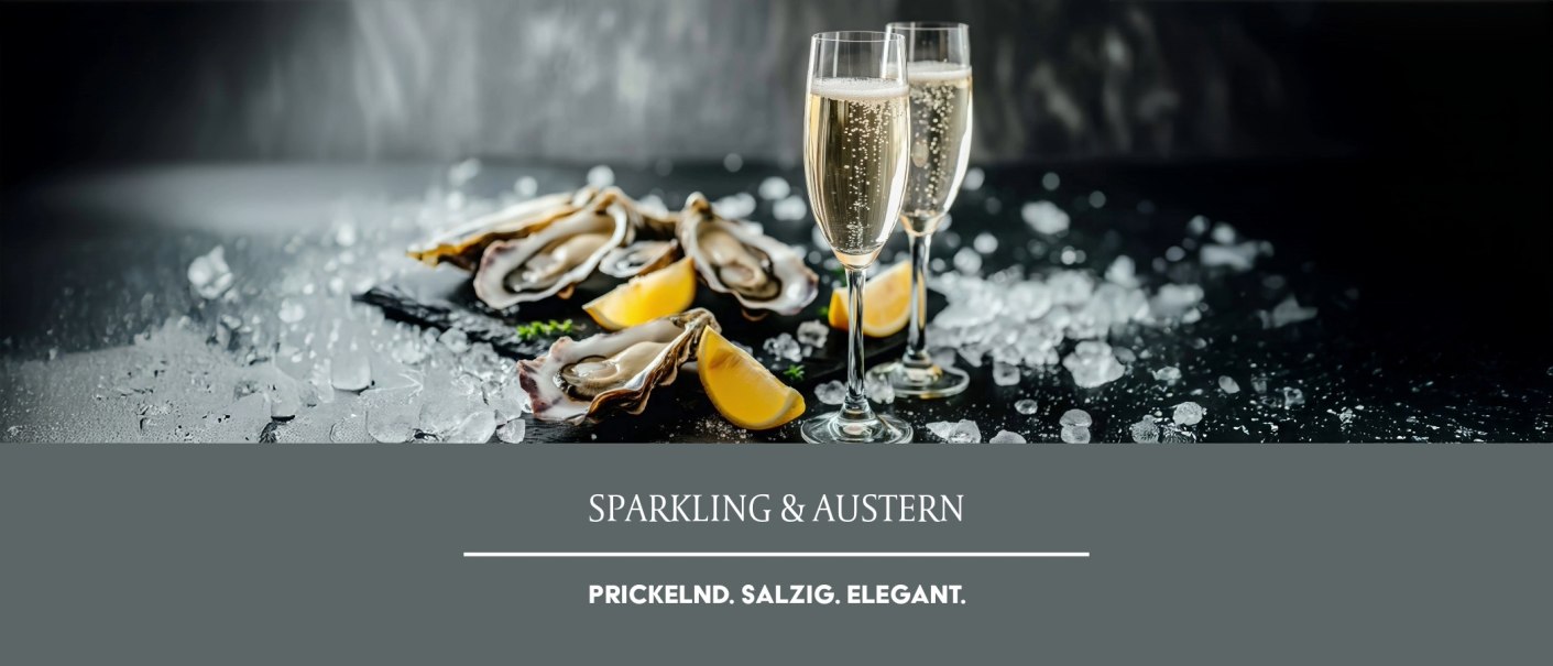 Zwei Sektgl&auml;ser und Austern auf Eis, garniert mit Zitronenscheiben. Elegante Pr&auml;sentation von prickelndem Getr&auml;nk und Meeresfr&uuml;chten., &copy; Weinmanufaktur Stuttgart eG
