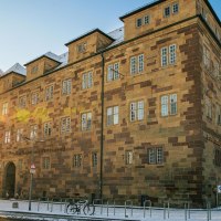 The Old Palace in Stuttgart, home of the W&uuml;rttemberg State Museum, in the sunlight. A bicycle stands in front of the historic building., &copy; Stuttgart-Marketing GmbH, Sarah Schmid