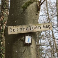 Wooden sign 'Dornhalden-Weg' attached to a tree in the wintry forest., &copy; Stuttgart-Marketing GmbH