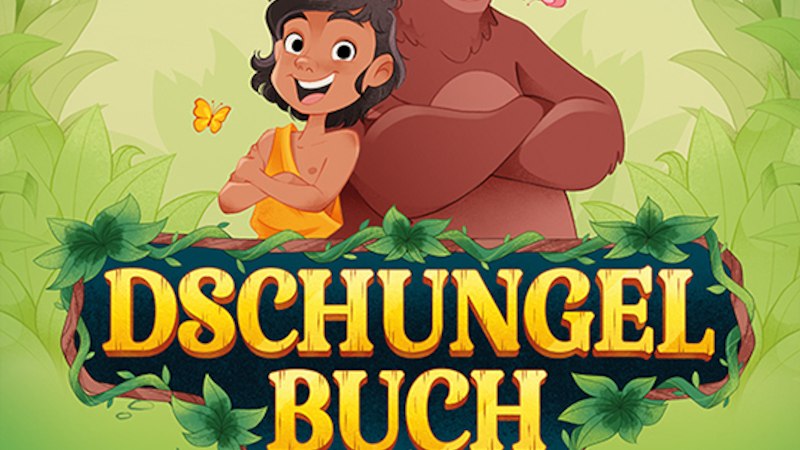 Baloo the bear and Mowgli dance happily in front of a background with leaves and a tiger's eye. The words 'Jungle Book - the Musical' are prominently displayed., &copy; Theater Liberi